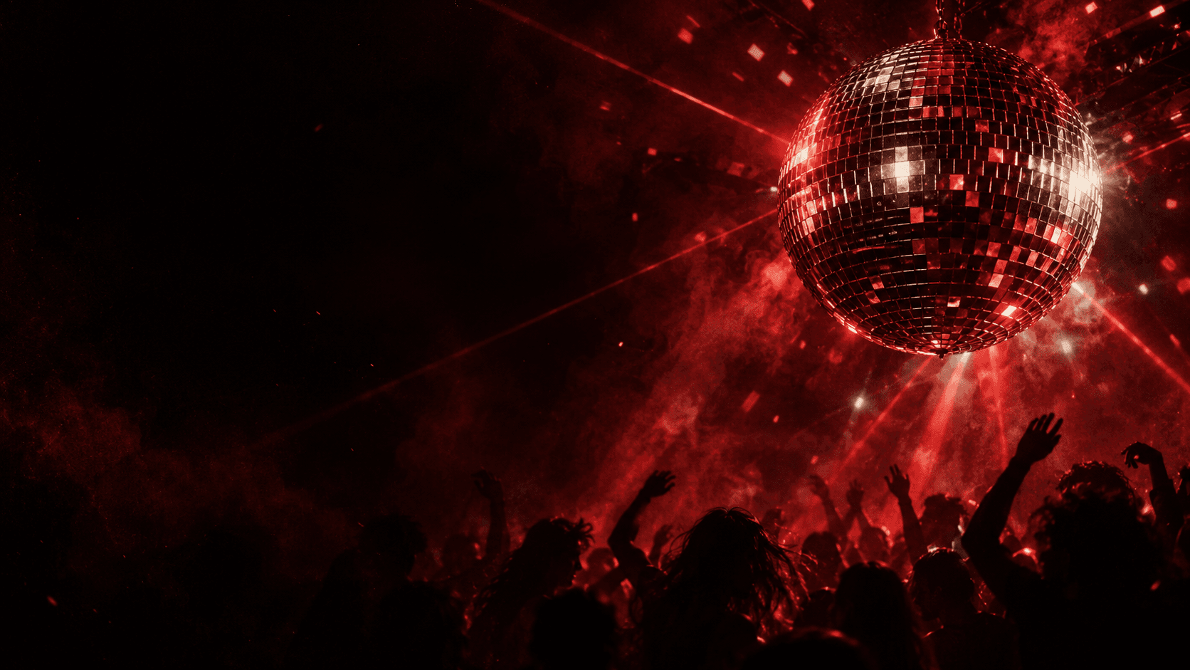 Conceptual artwork of red lights and a mirrored disco ball